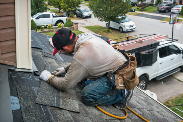 Professional Flat Roof Repair technician working in Madbury, NH
